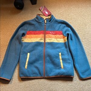 Cotopaxi Kids L Blue Jacket with Red and Yellow Stripes NWT